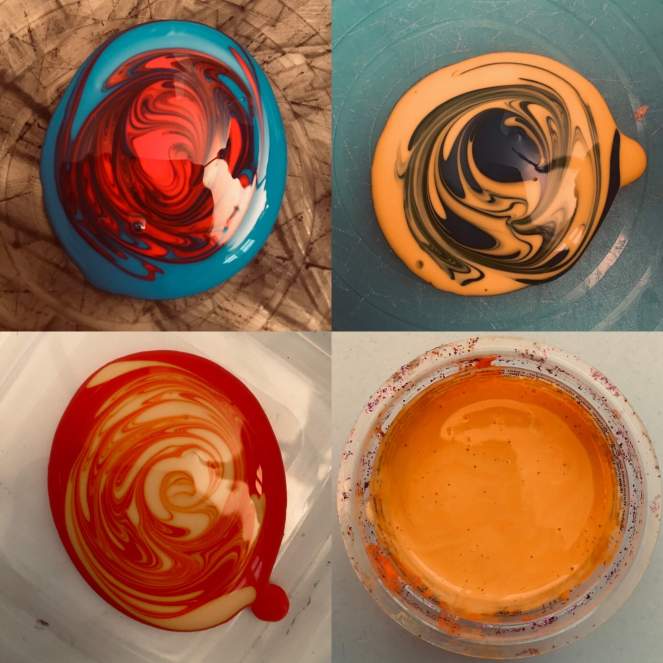 A series of images showing primary colour paints in the process of being mixed, with the final image showing newly created orange paint