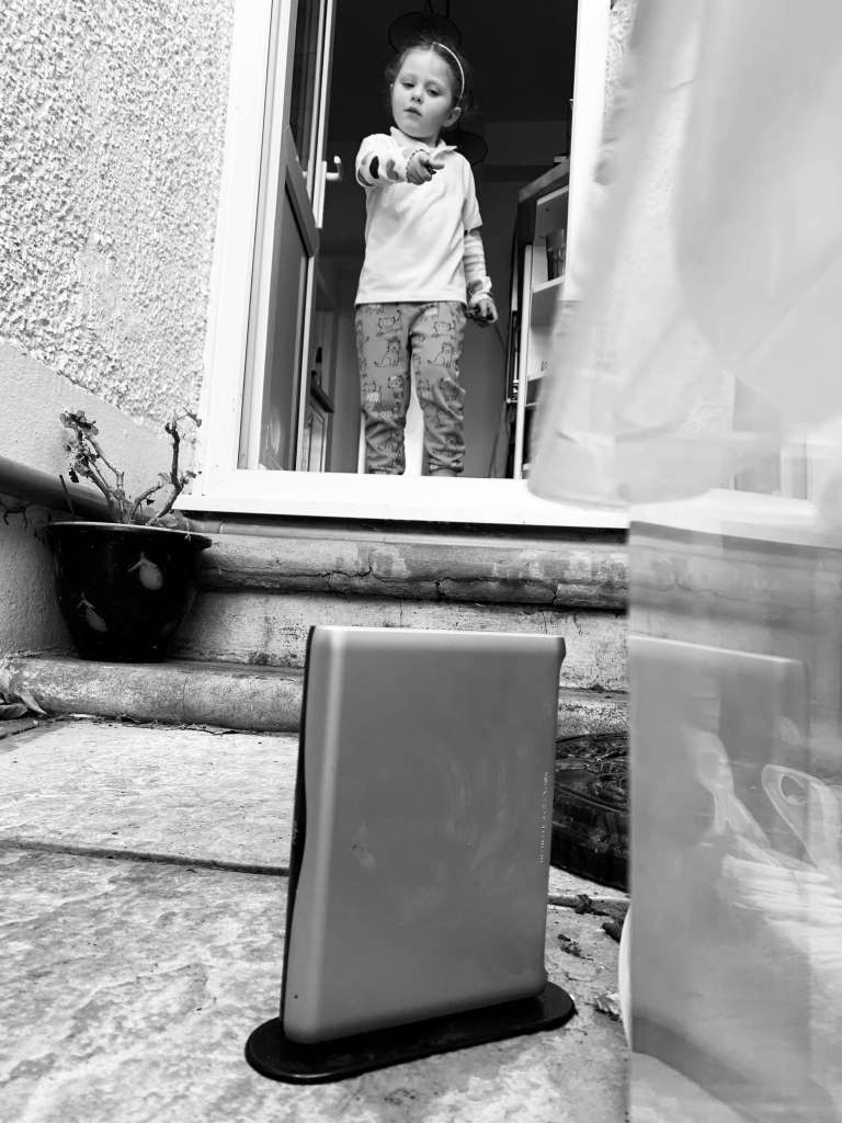 a girl 'tells off' a wifi router