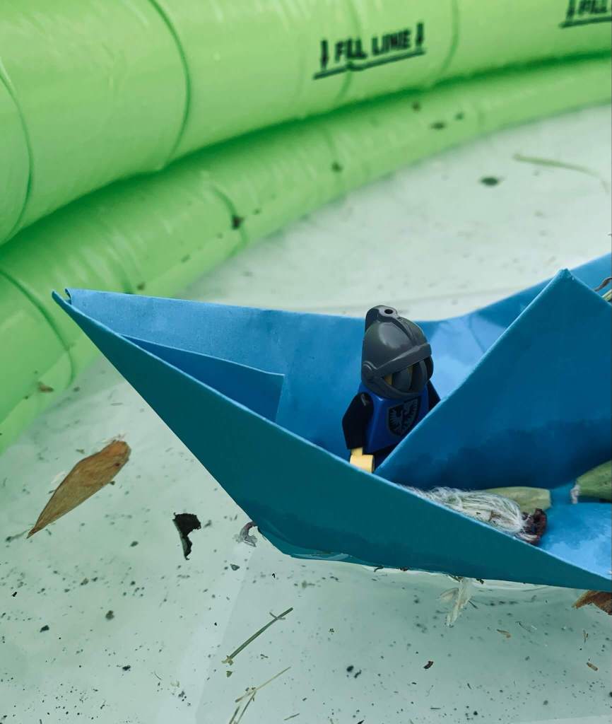 Paper boats used to illustrate a STEM exercise